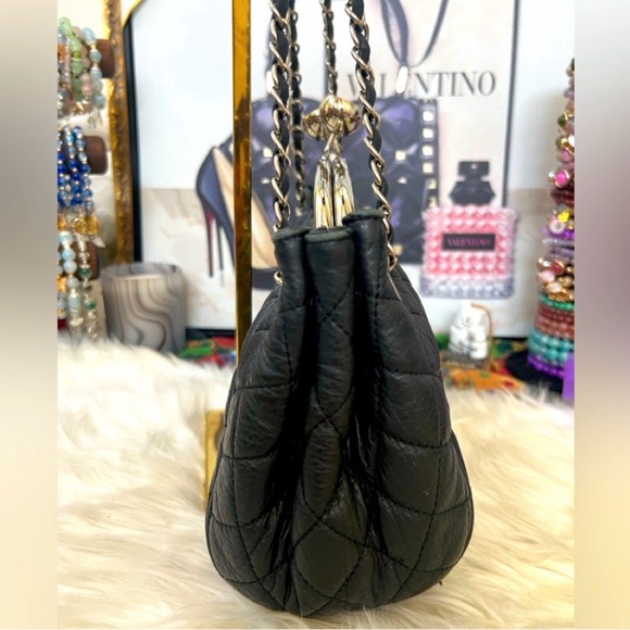 New Listing!!!
Elegant Black Quilted Genuine Leather Handbag - Picture 4 of 9